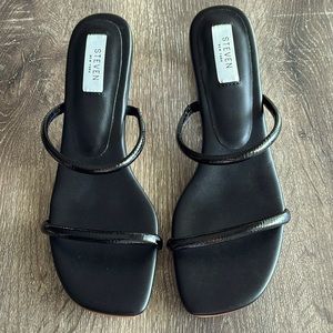 Steve Madden heeled sandals.